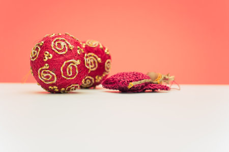 Christmas time decorations with sapce for text on a white red paper surfaceの写真素材