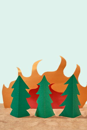 Forest landscape in forest fire. Paper origami conceptの写真素材
