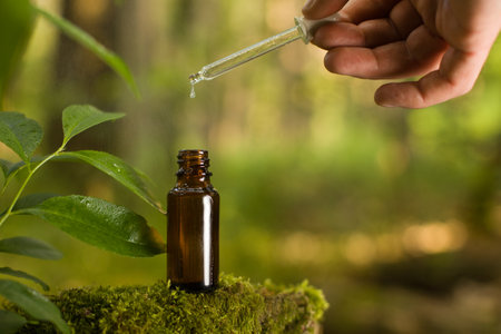 Natural remedies, aromatherapy - pipette & bottle. Organic alternative medicine, amber bottles.の写真素材