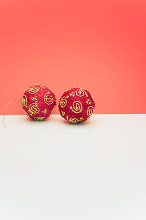 Christmas time decorations with sapce for text on a white red paper surfaceの写真素材