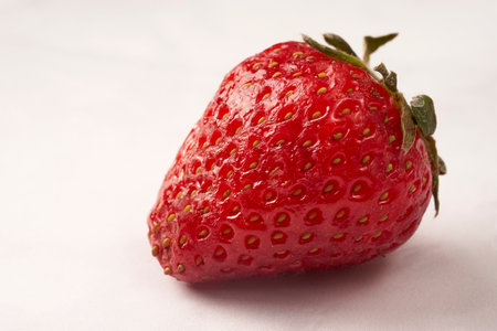 close up strawberry on white marble white background isolatedの写真素材