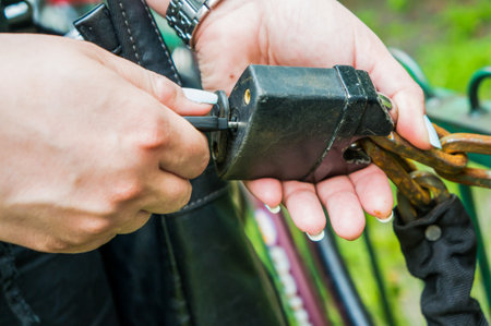 Person protecting property with a lock