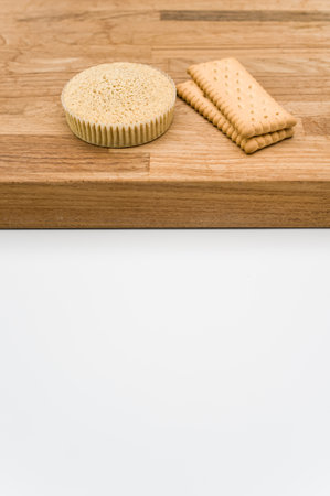 buckwheat flour organic cake and biscuits on a wooden and white background with copy space