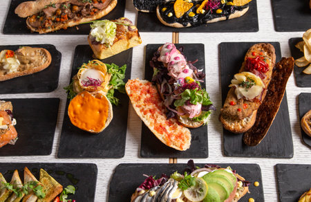 Variety of creative sandwiches on the restaurant tableの写真素材