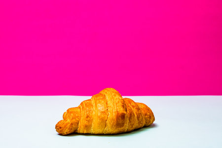 Detail of fresh croissant isolated, french breakfast concept.の写真素材