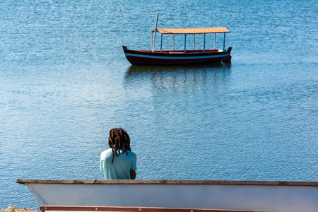Cachoeira, Bahia, Brazil - November 29, 2014: A man looking at the Parguacu river in Cachoeira in the Brazilian state of Bahia.の写真素材