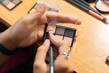 Smearing brush on makeup paletteの写真素材