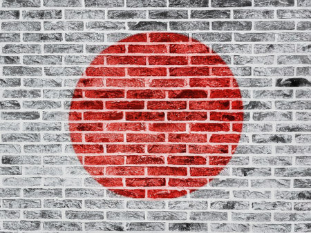 full frame of japanese flag, hi-no maru on brick wallの写真素材