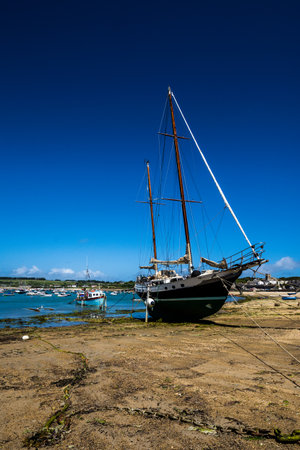 A two masted ketch on the beach at Hugh Town.