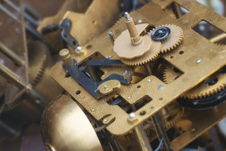 Rustic gear clock mechanism, close-up of old clock mechanism with gears. selective focus.
