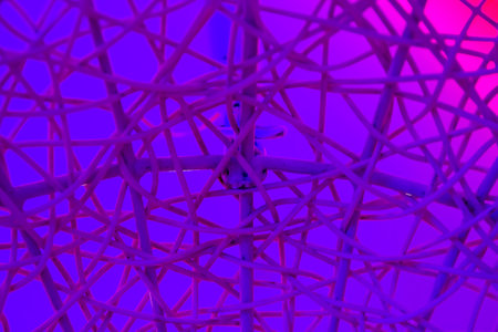 Texture of plastic rattan straw chair on color background.の写真素材