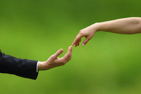 man and woman hand touchingの写真素材