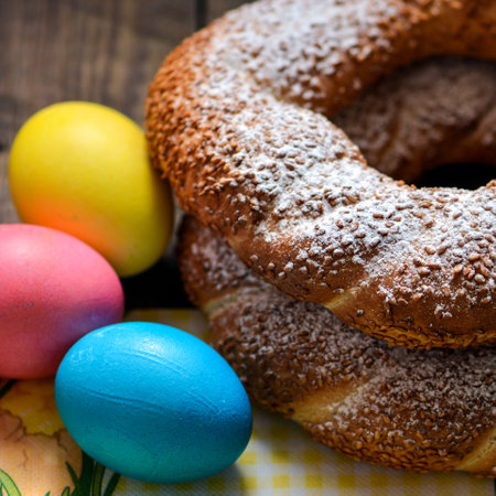 Colorful festive easter eggs and easter sweet baking