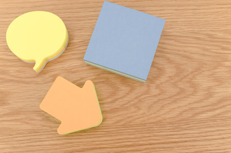 colorful sticky notes sheets for messaging and notes on a wooden background