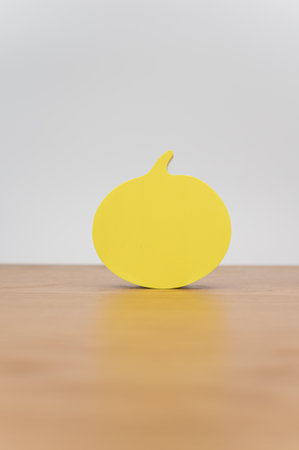 colorful sticky notes sheets for messaging and notes on a wooden backgroundの写真素材