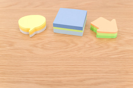 colorful sticky notes sheets for messaging and notes on a wooden background