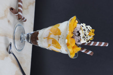 peach wafer and whipped cream ice creamの写真素材