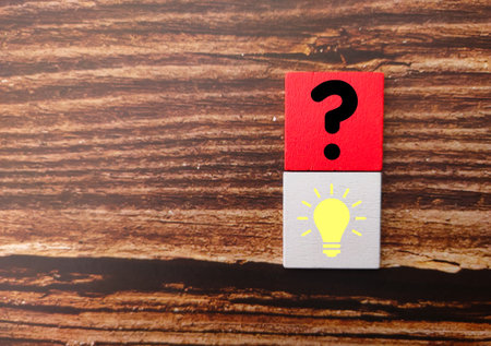 Colored cubes with question and idea icons. the concepts of Q and A.