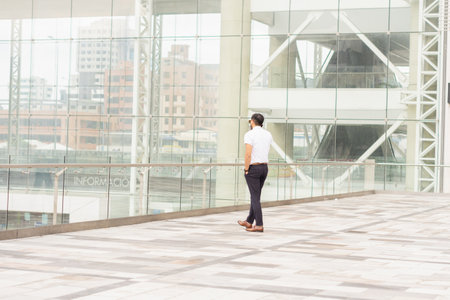 Young enterprising man, striving for his business. Giving the best of himself to be able to fulfill his goals.の写真素材