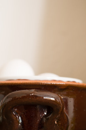 rustic terracotta bowl handle extreme close up