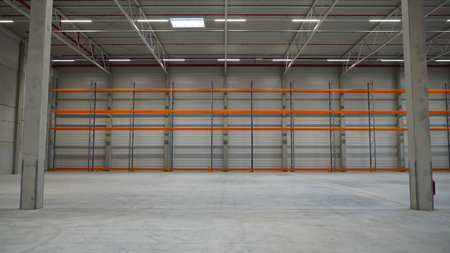 logistics warehouse with empty high racks