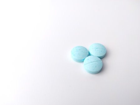 Piles of pills and capsule on white background,isolated,copy space.Selective focus.の写真素材