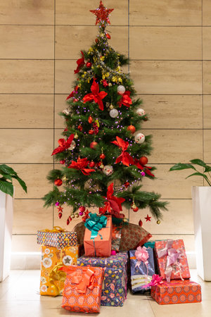 Christmas scene with gifts under the treeの写真素材