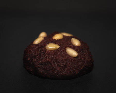 Beetroot carob Cookie with pine nuts and chocolate drops, healthy gluten free foodの写真素材