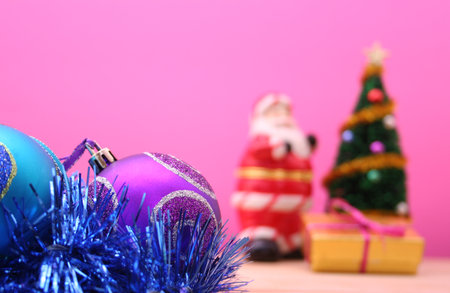 Christmas Ornaments and Christmas Tree on Pink Backgroundの写真素材