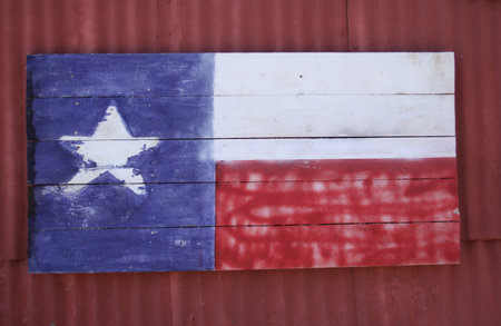 Rustic Barn With Texas Flag close-upの写真素材
