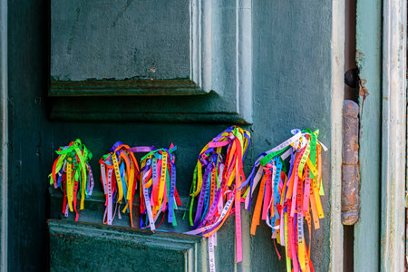 Famous ribbons of good luck from Our Lord of Bonfim tied to the door of the church in Salvador,...