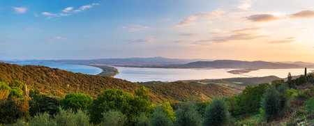 Sunrise landscape at Orbetello lagoon natural park, beautiful sky scenic coast aerial view from Monte Argentario, tourism destination Tuscany Italyの写真素材