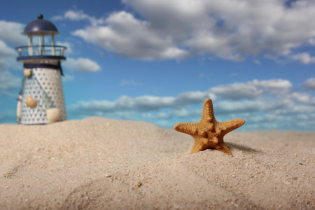 Lighthouse With Seashell on Beach, Close up on Shell Shallow DOFの写真素材