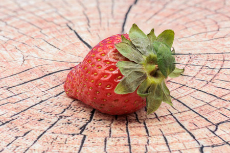 Fresh red ripe strawberry isolated on white, macro imageの写真素材