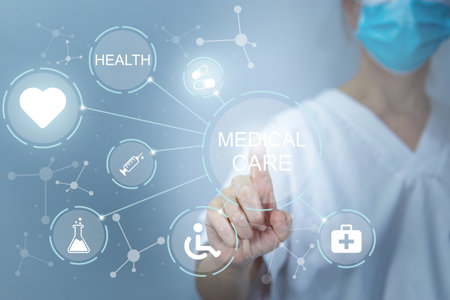 Doctor working on a virtual screen behind the structure of medical icons, medical care and health conceptの写真素材