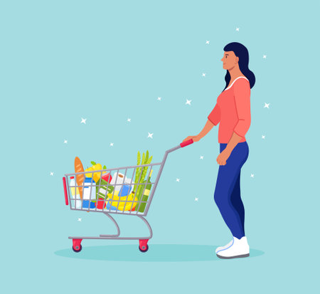 Woman pushing shopping cart full of groceries in the supermarket. There is a bread, bottles of water, milk, fruits, vegetables and other products in the basketのイラスト素材