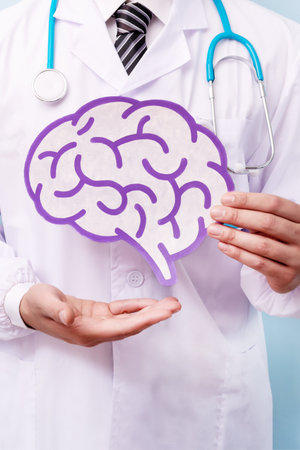Scientist man has holding brain figure. Neurology, neurosurgery, neuroscience and Mental health...