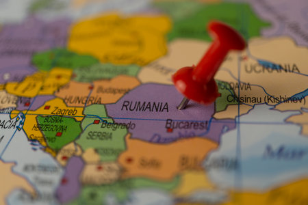 romania marked on the map with a thumbtack, travel destination planningの写真素材