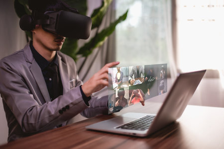 Businessman making video call with colleagues online meeting, learning, teaching, onlineの写真素材