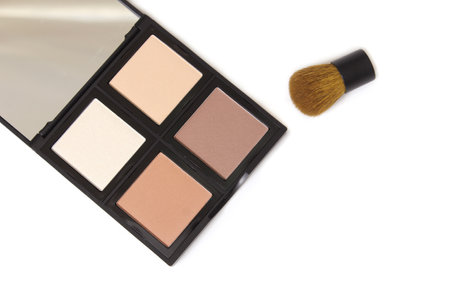 Cosmetic Palette and brush on White Background Contour and Highlighter