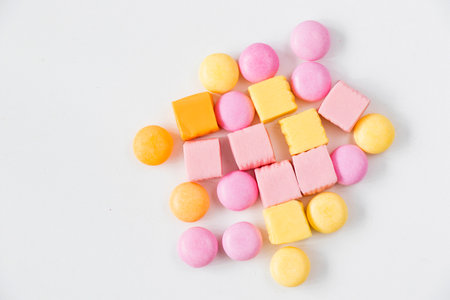 Sweet colorful confectionery, candy on the white background, high angle viewの写真素材