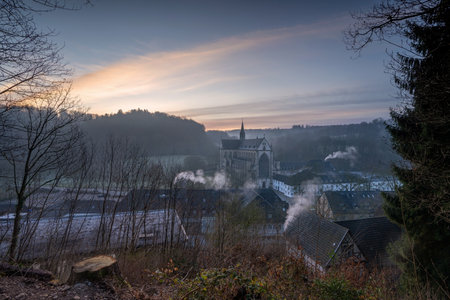 ODENTHAL, GERMANY - MARCH 18, 2022: Panoramic image of the Altenberg cathedral in early morning light on March 18, 2022 in Germanyの写真素材