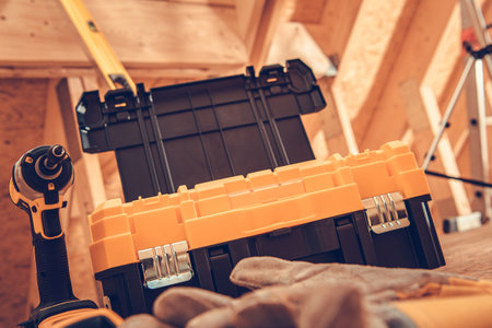 Construction Worker Tools Box and Power Tool Close Up. Construction Site Equipment.の写真素材