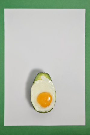 Closeup Abstract Fried Egg On Avocado Sliceの写真素材