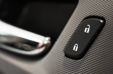 Modern Car Central Door Locking Button. Close and Open Signs. Automotive Industry Theme.の写真素材