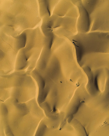 Aerial view of sand dunes in a desert.の写真素材