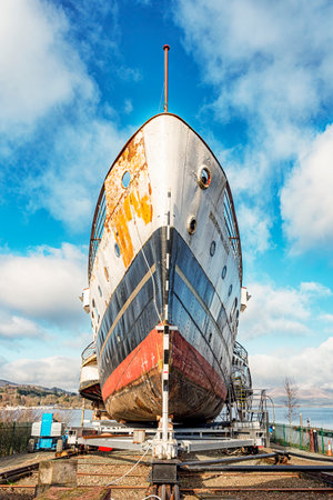 BALLOCH, SCOTLAND - MARCH 01, 2022: The maid of the loch paddle steamer under restoration by a group of volunteers.の写真素材