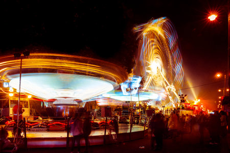 Multi-light trace of various rides operating at St Giles Fair, Oxford.September 2016