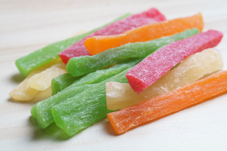 natural treat: multicolored sugary fruit candy sticksの写真素材