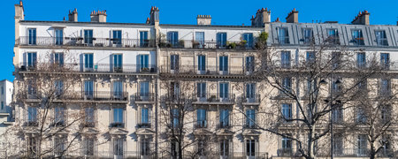 Paris, typical facade and windows, beautiful building in the 11e arrondissementの写真素材